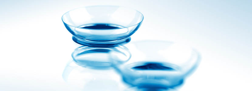 two contact lenses on a mirror